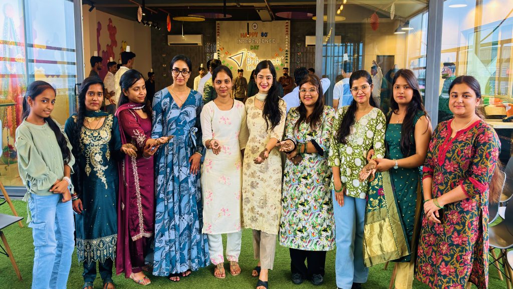 Colleagues in festive dress at an office celebration