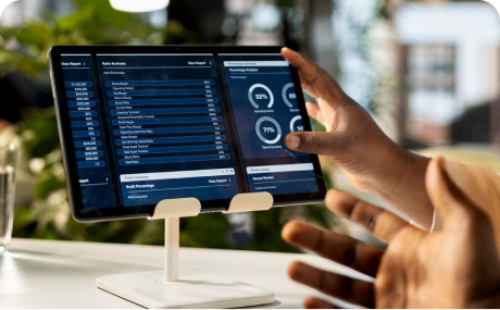 Hand interacting with a digital dashboard display